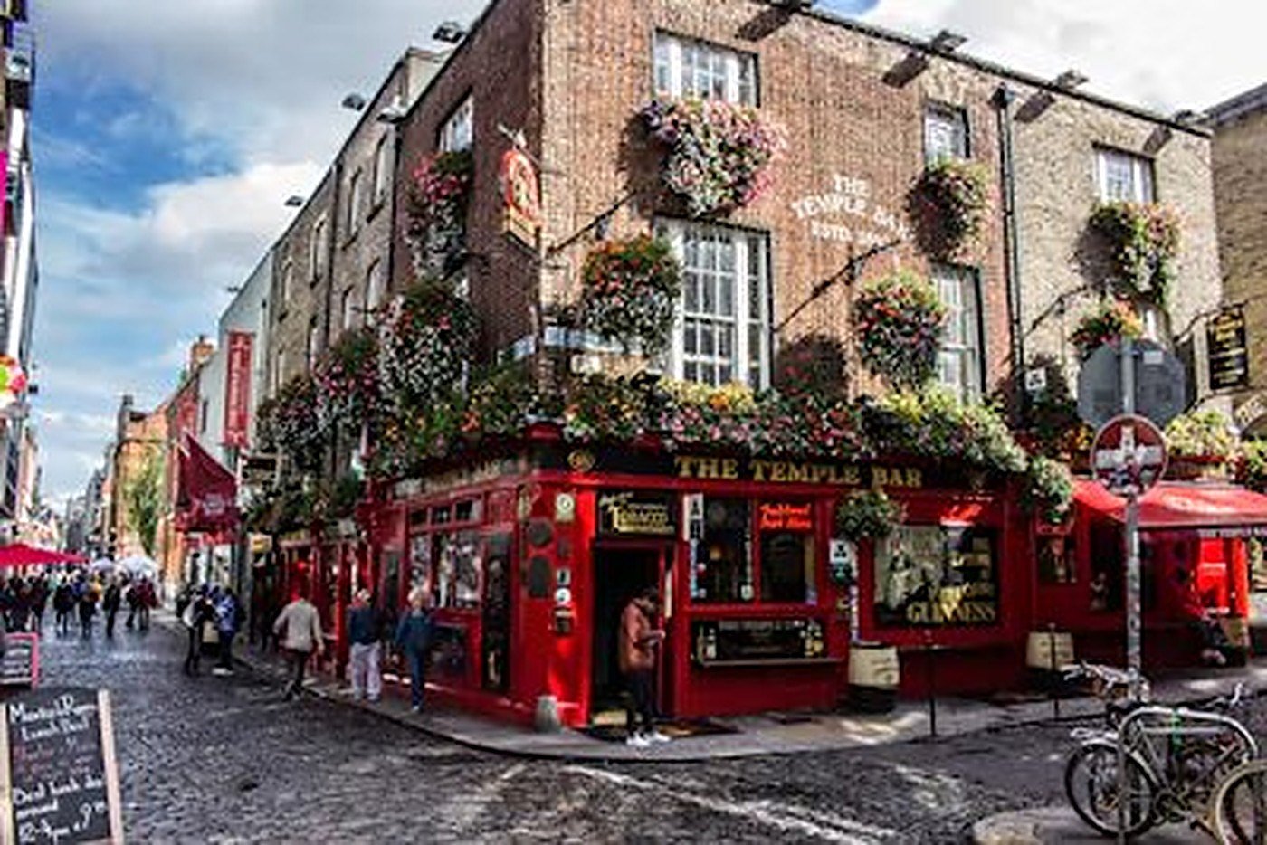 A lively street in Temple Bar, Dublin, on a sunny day