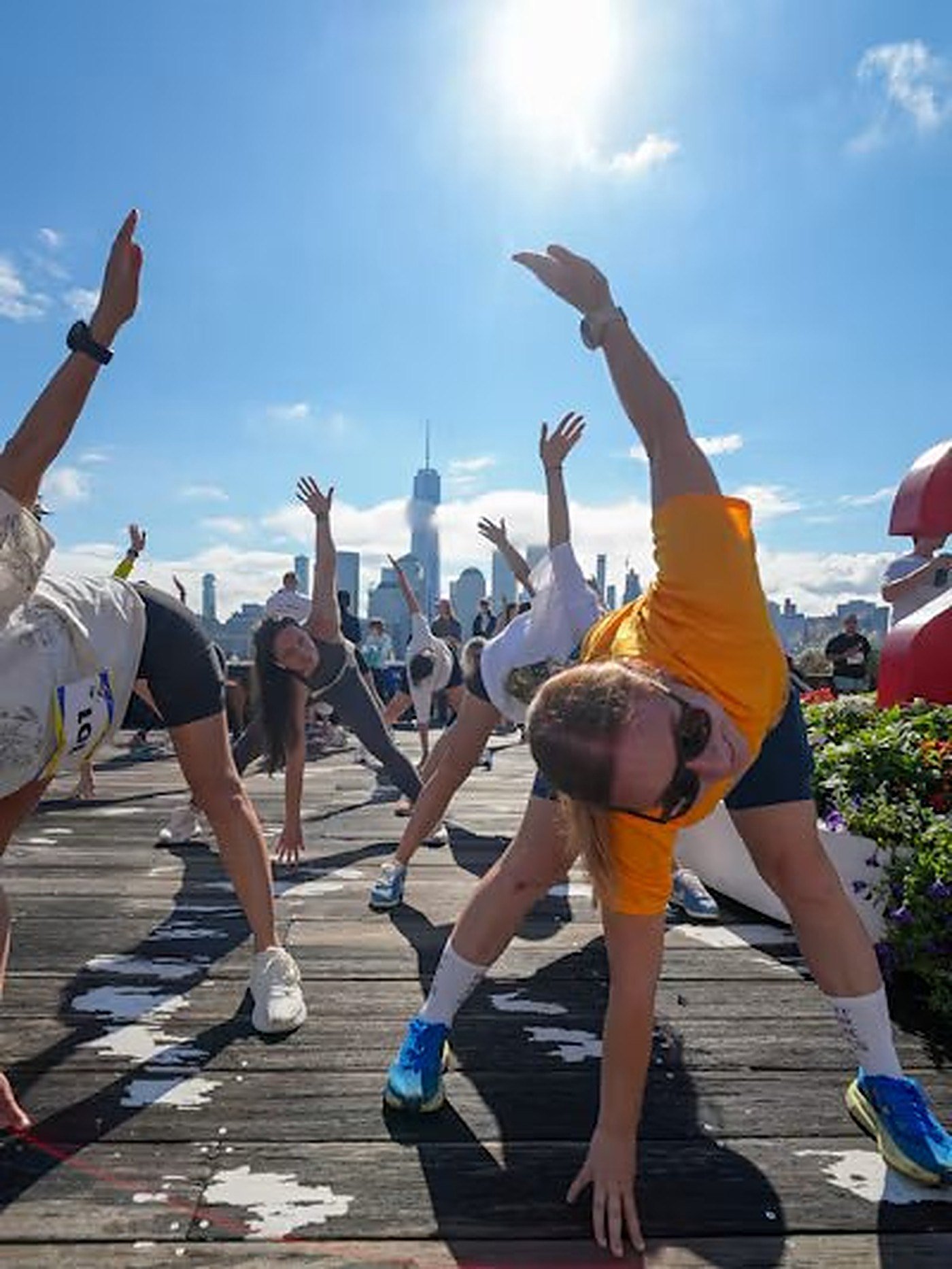 Friends stretching together outdoors